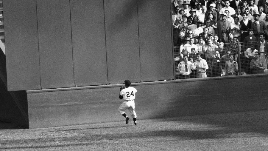 Image: The New York Giants' Willie Mays makes a catch of a ball hit by Cleveland Indians' Vic Wertz in Game 1 of the 1954 baseball World Series in New York's Polo Grounds on Sept. 29, 1954.